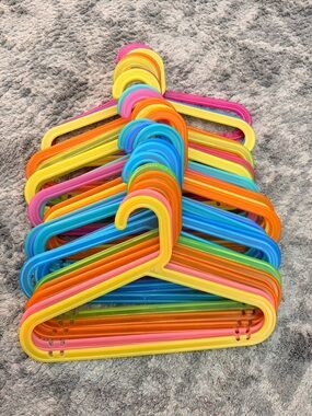30- IKEA kids sturdy plastic hangers. Random mix of colors.